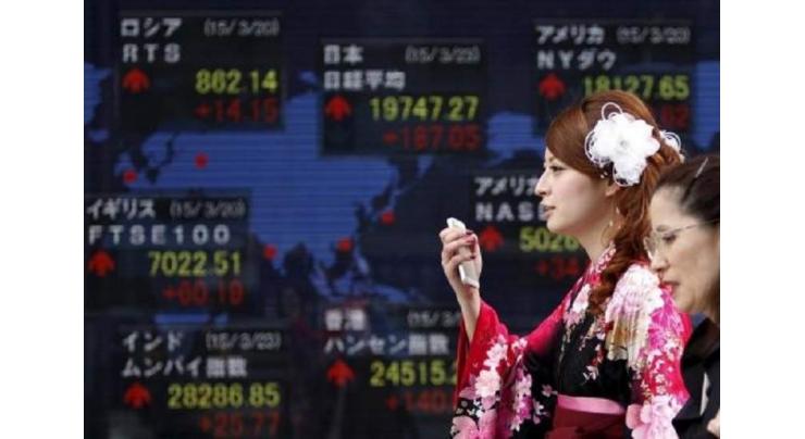 Asian stocks mostly up but tempered by virus, election fears
