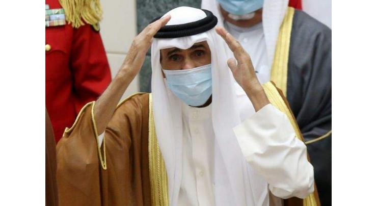 Kuwait's late emir buried after his successor is sworn in
