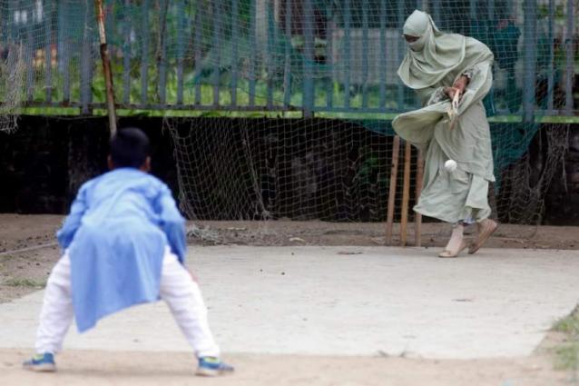 Bangladeshi woman, her son’s pictures playing cricket go viral