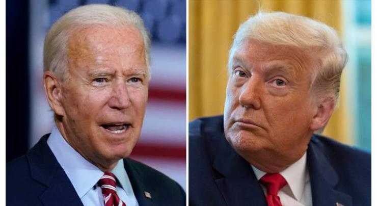 Trump backpedals over racist group row, Biden blasts him as 'embarrassment'
