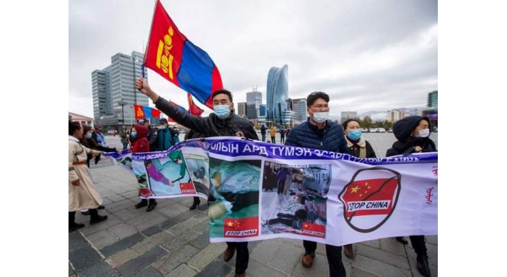 Mongolians rally against China days before Pompeo visit
