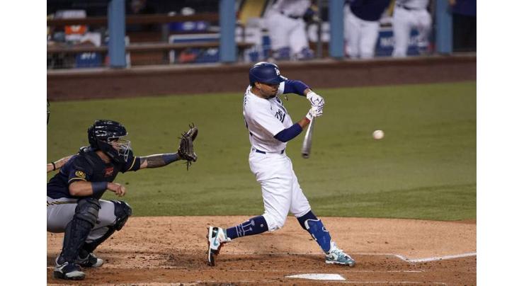 Dodgers defeat Padres, Astros put A's on brink of elimination
