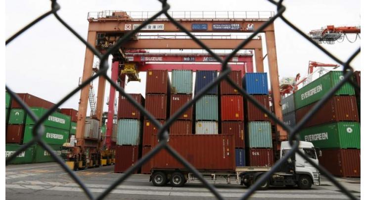 Japan's half-year exports log sharpest drop in over decade
