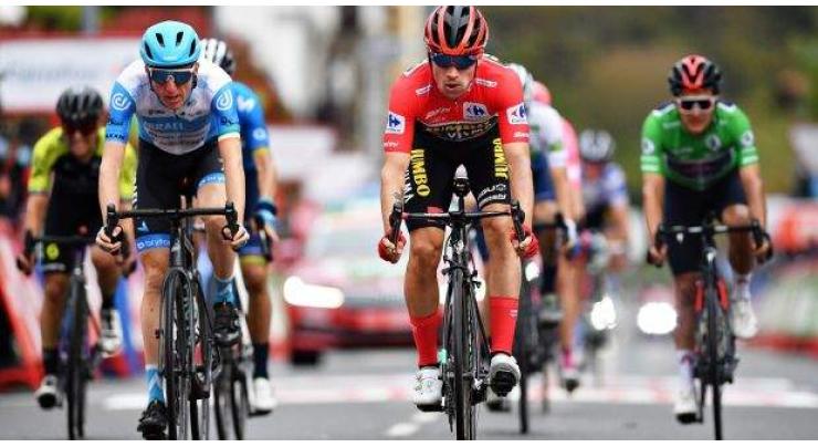 Martin wins Vuelta stage 3 as Roglic keeps lead

