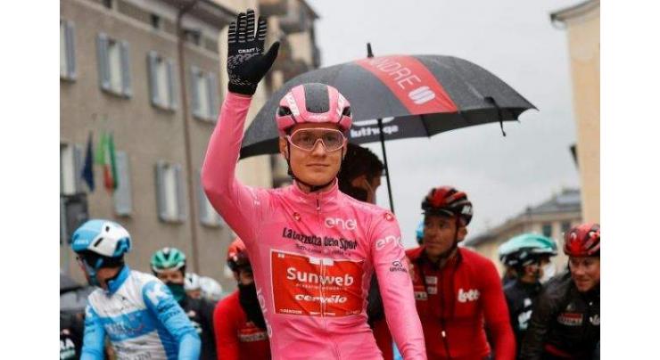 Giro interrupted as rain causes rider revolt
