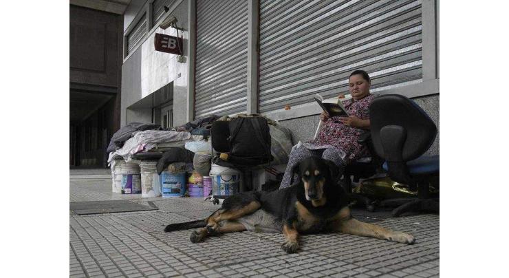 Police torch shelters in Argentina to clear homeless
