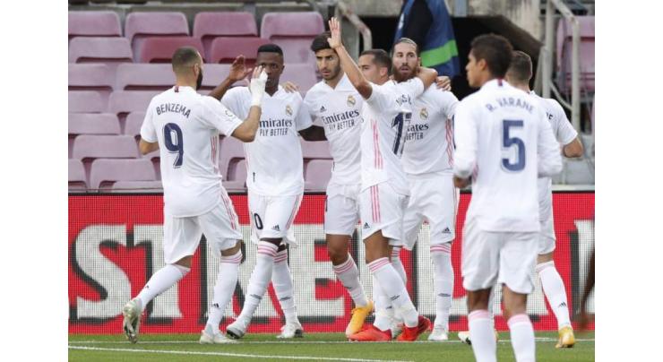 Hazard stunner gives revived Real Madrid win over Huesca
