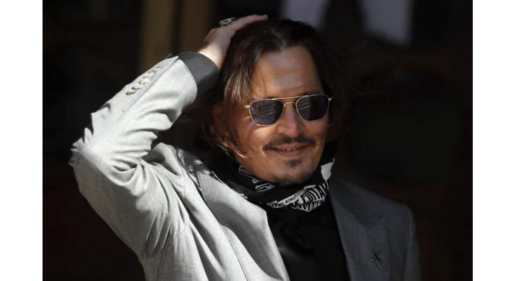 Depp loses UK libel case on 'wife beater' claims
