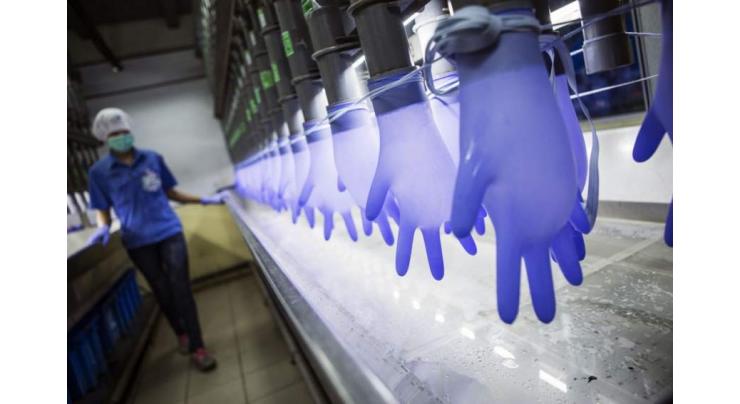 World's top surgical glove maker shuts factories due to coronavirus
