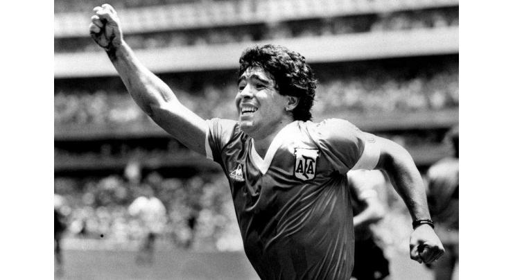 Argentines file in for Diego Maradona's wake in Buenos Aires
