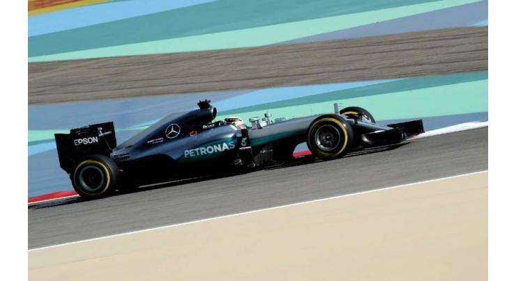 Hamilton scorches to pole in Bahrain with record-breaking lap
