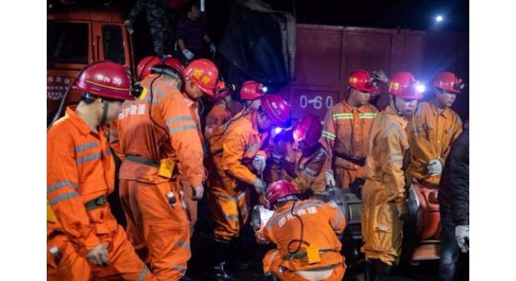 Rescue underway for 13 trapped coal miners in central China
