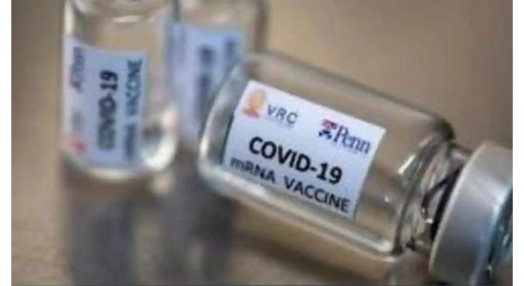 Britain okays vaccine as global Covid death toll nears 1.5 million

