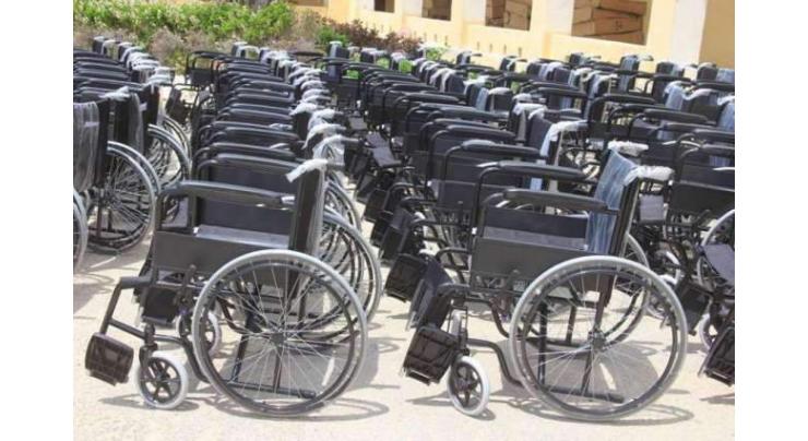 Wheelchairs distributed among 80 persons with disabilities
