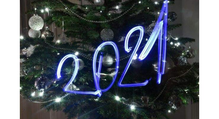 World begins ushering in locked-down New Year
