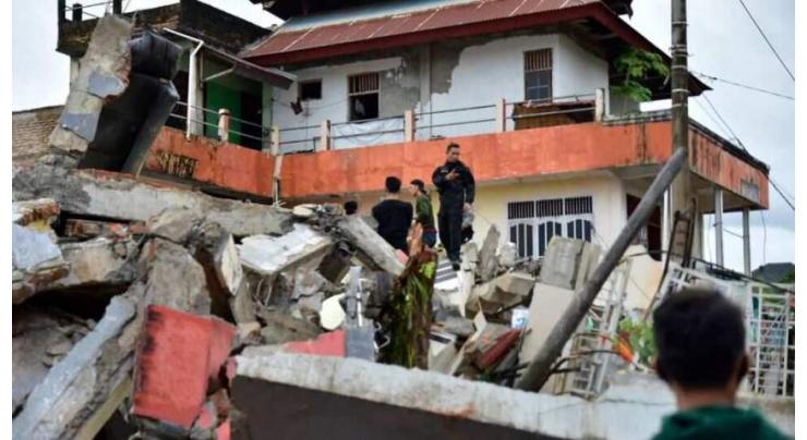 Powerful Indonesia quake kills at least 34, topples buildings
