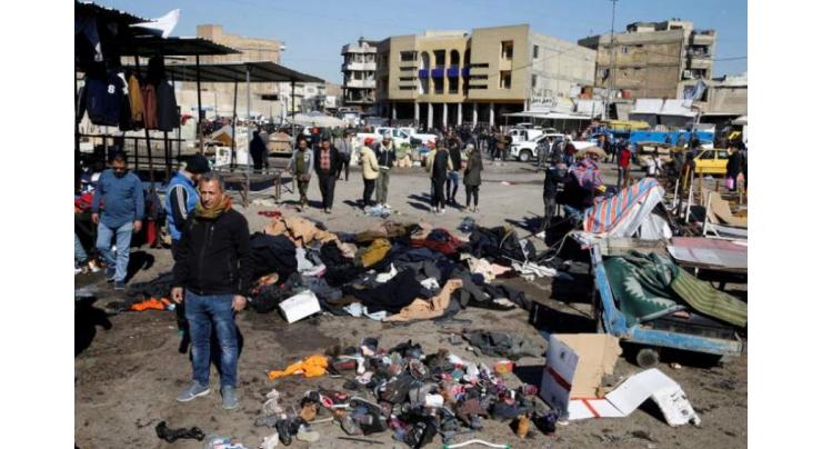 Twin suicide blasts in Baghdad leave nearly 30 dead
