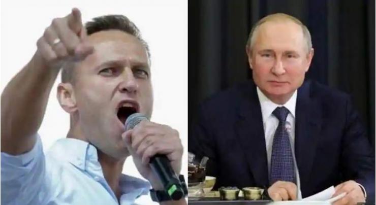 In call, EU chief urges Putin to release Navalny
