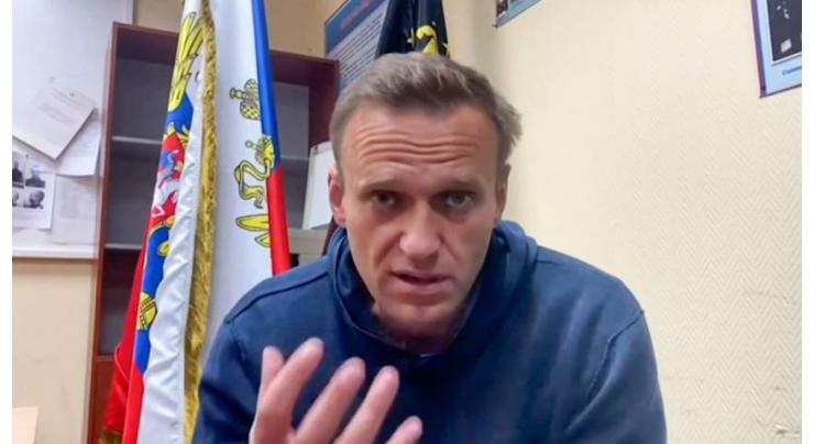 Kremlin dismisses calls to free Navalny, warns against protests
