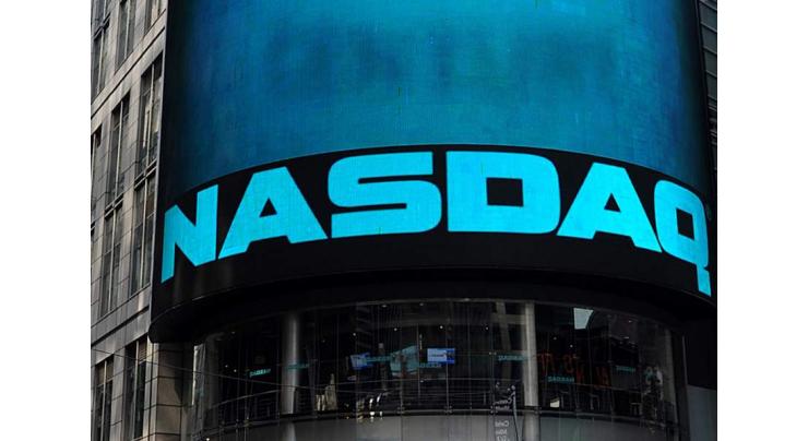 Nasdaq rises again ahead of tech earnings, Dow drops

