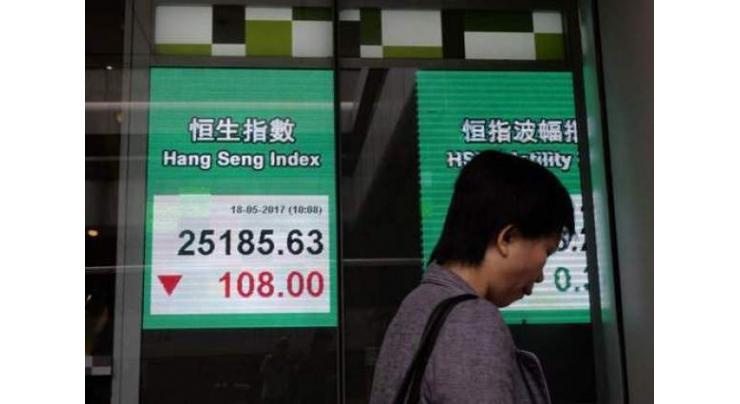Tokyo stocks rise in morning, Nikkei briefly hits 30-year high
