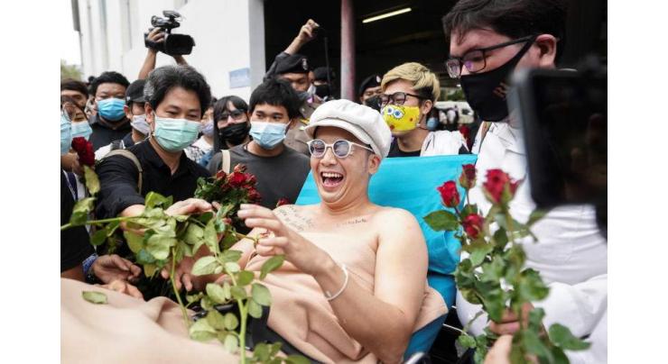 Thai Singer Confesses to Burning King's Portrait After Arrest ' Reports
