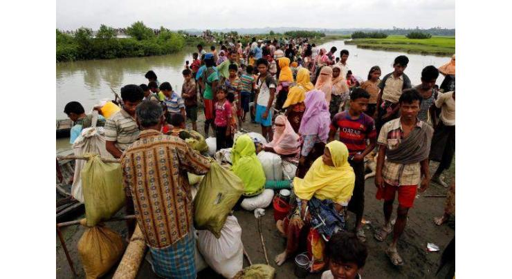 Refugees trickle across India border from Myanmar turmoil
