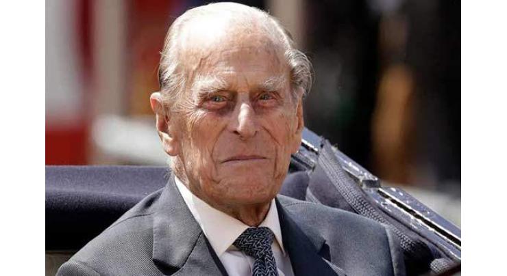 Britain's Prince Philip moved back to private hospital
