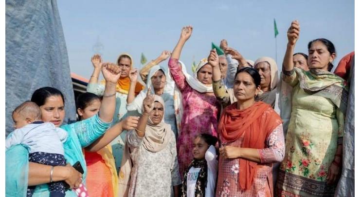 TIME features women leading India's farmer protests on its cover
