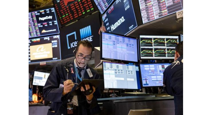 US stocks mostly higher on progress of stimulus package
