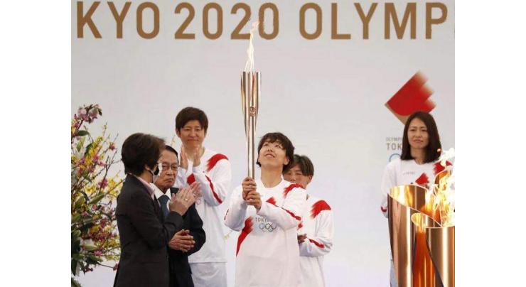 'Ray of light': Olympic torch relay begins after year's delay
