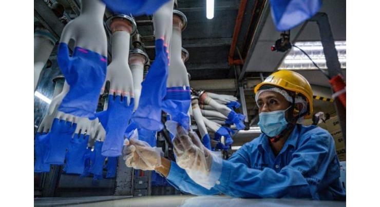 US to seize gloves made by Malaysian firm over forced labour
