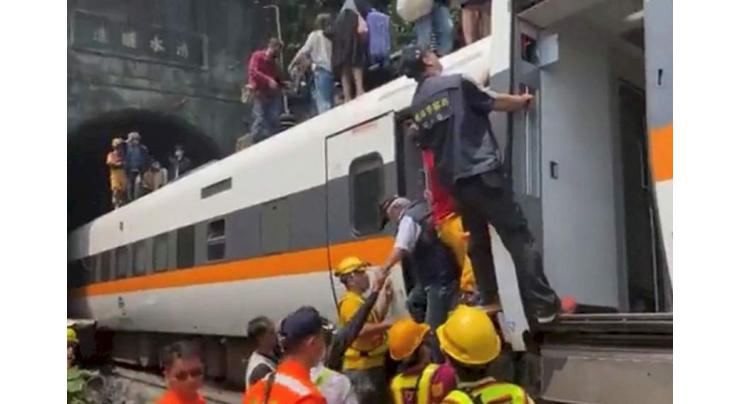 At least 49 dead as Taiwan train derails in tunnel
