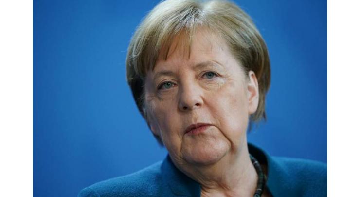 Merkel urges Russia to reduce troops on Ukraine border
