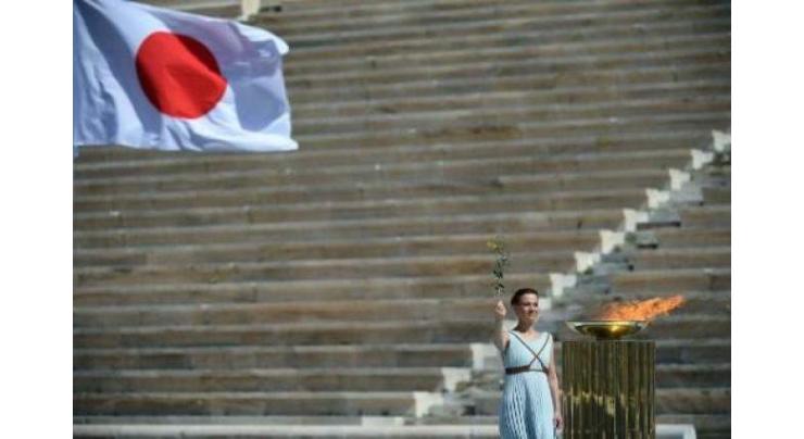 Olympic torch relay cancelled in Japanese city over virus surge
