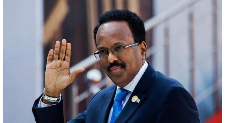 Somali president signs law extending mandate for two years
