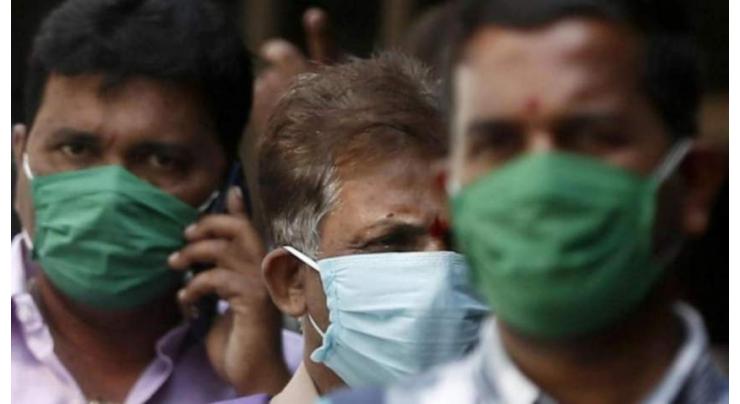 Delhi faces 'grim' virus battle as cases jump again: minister
