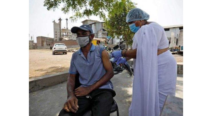 Delhi warns of 'grim' coronavirus battle as surge hits new record
