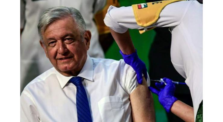 Mexican president gets Covid vaccine, says 'no risk'
