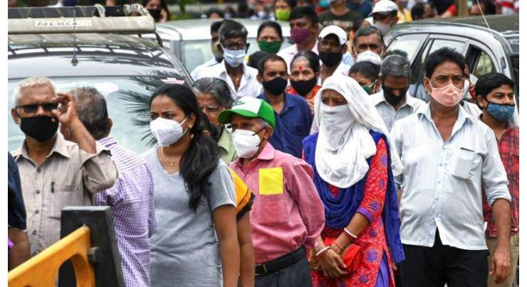 India virus surge drives record global daily cases
