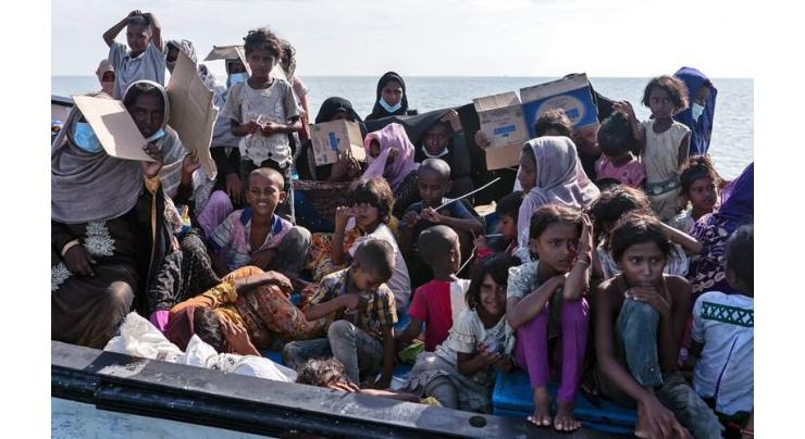 Bangladesh rescues 30 Rohingya adrift for two days after pirate attack

