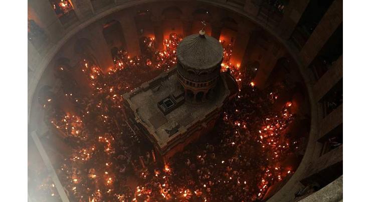 Holy Fire Descends at Church of Holy Sepulcher in Jerusalem