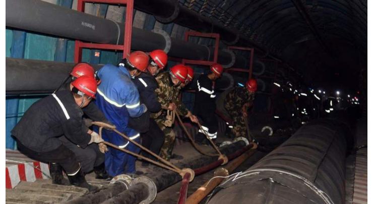 Rescuers search China mine for workers trapped for 3 weeks
