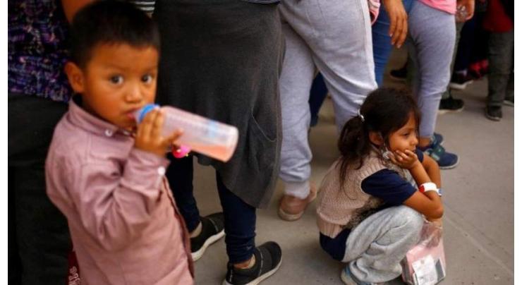 US to begin reuniting migrant families separated under Trump
