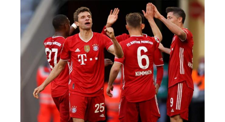 Bayern Munich win ninth Bundesliga title in a row
