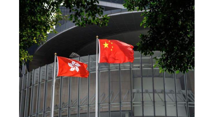 Hong Kong legislature approves China loyalty laws
