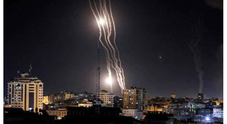 Hamas barrage at southern, central Israel kills child
