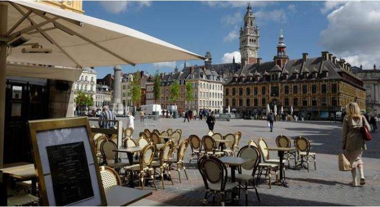 French return to cafes, museums after half-year Covid closure
