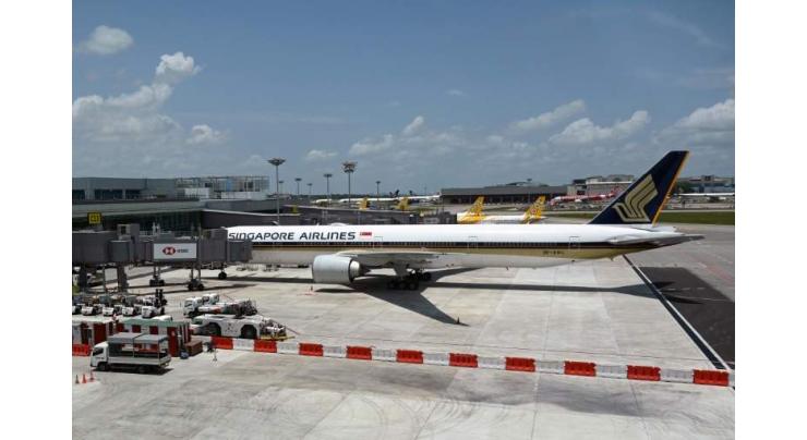 Virus-hit Singapore Airlines reports biggest annual net loss
