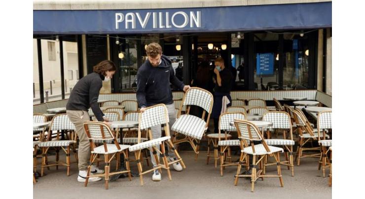 France savours new freedoms as cafes, museums reopen
